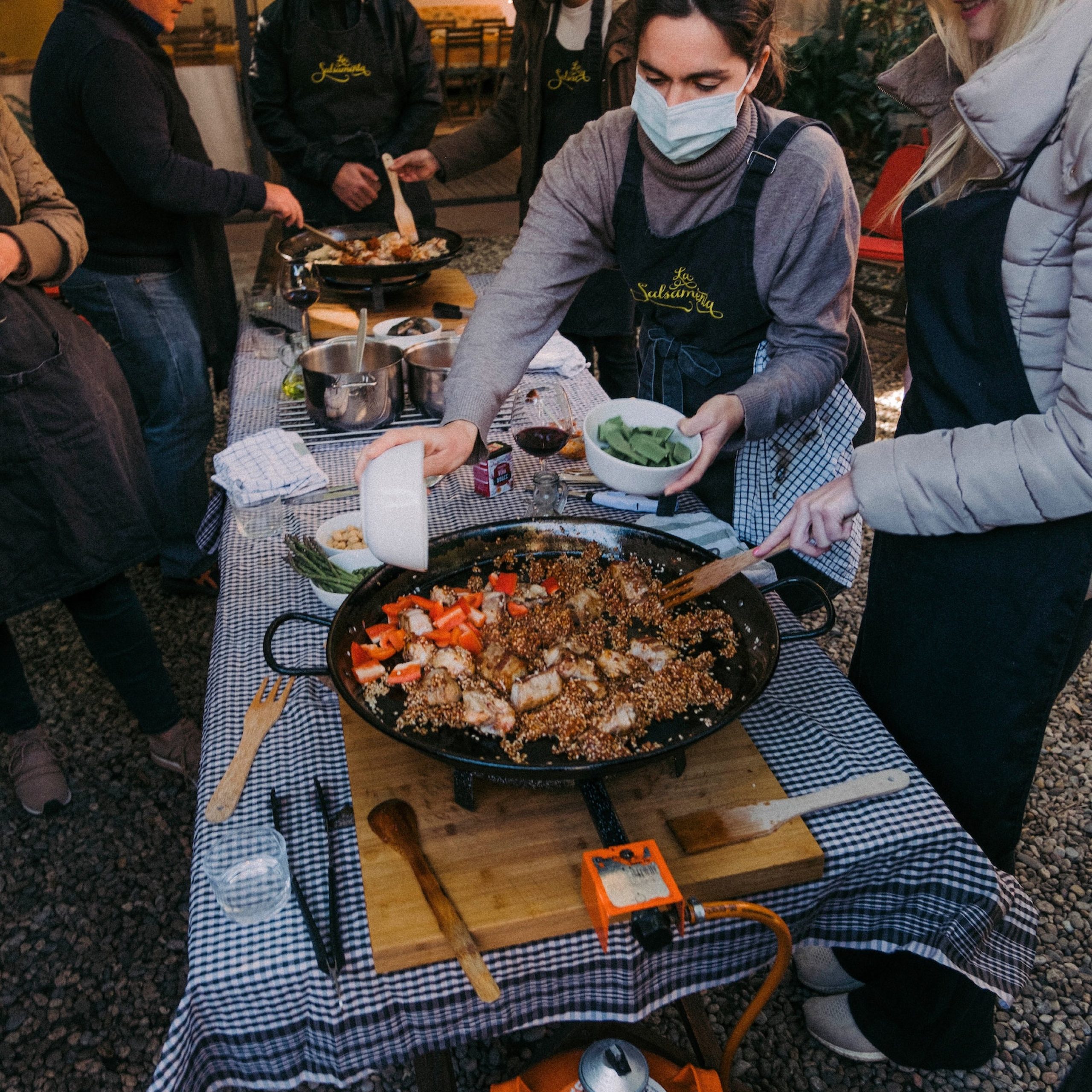 team cooking together the local dish